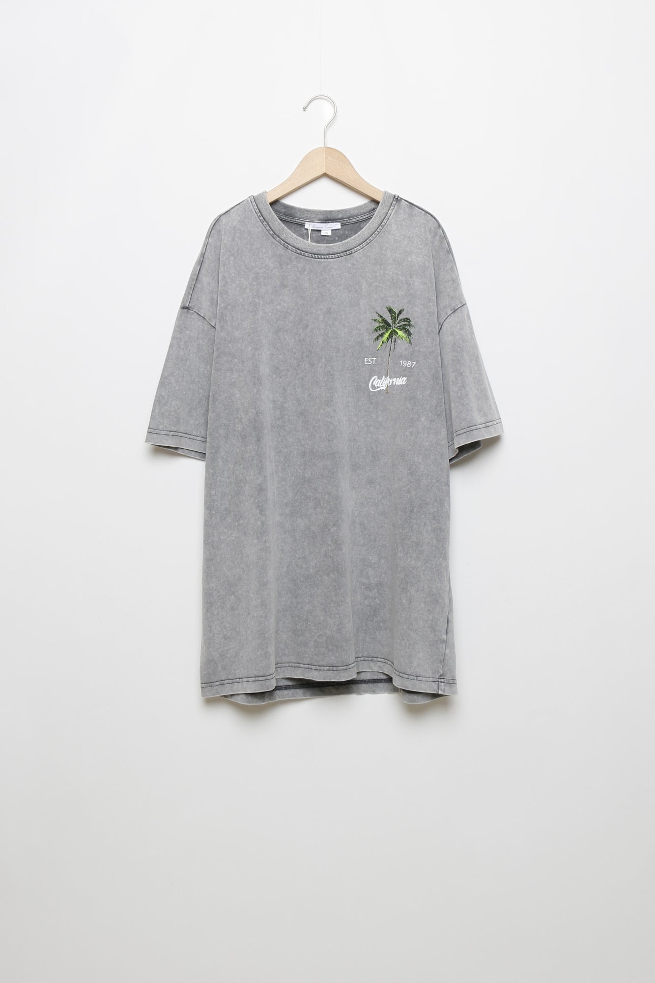 CALIFÓRNIA | T-shirt oversized com palmeiras