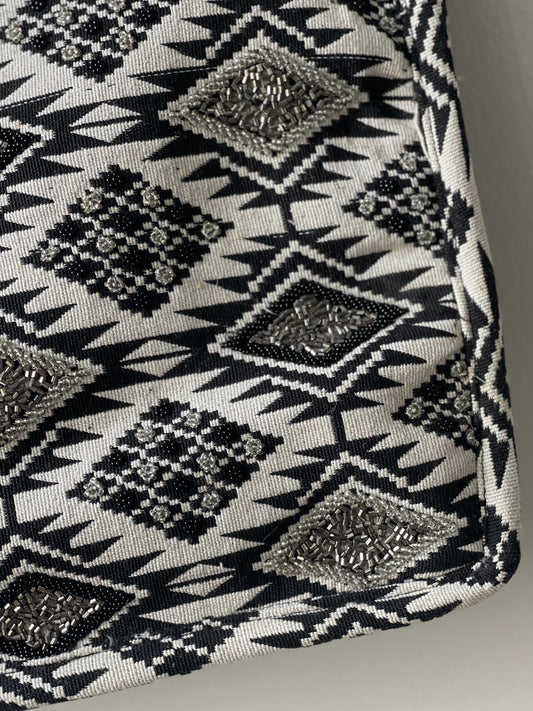 INCA | Saco com missangas