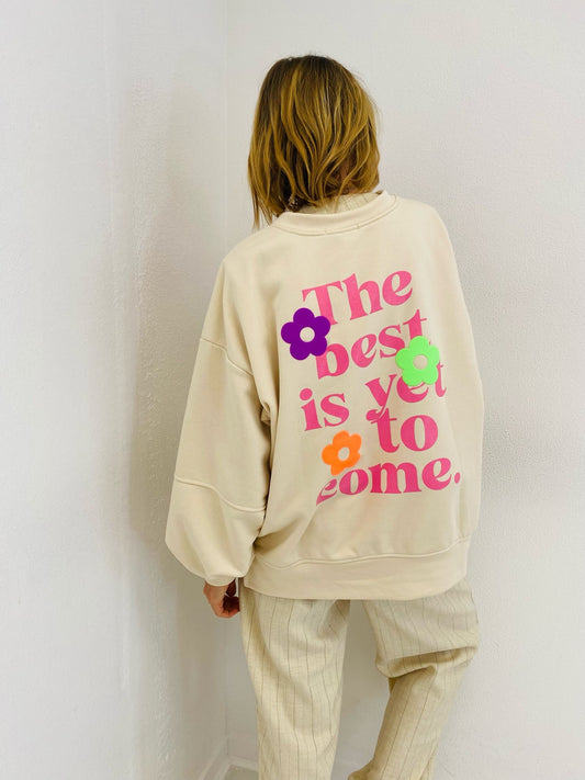 BEST IS YET TO COME | Sweat com frase e flores estampadas