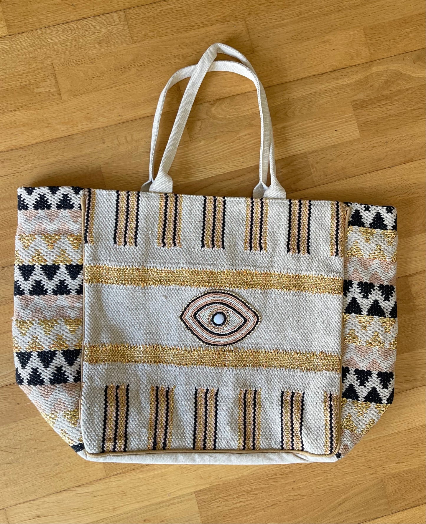 GOLDEN EYE | Cotton bag with beads