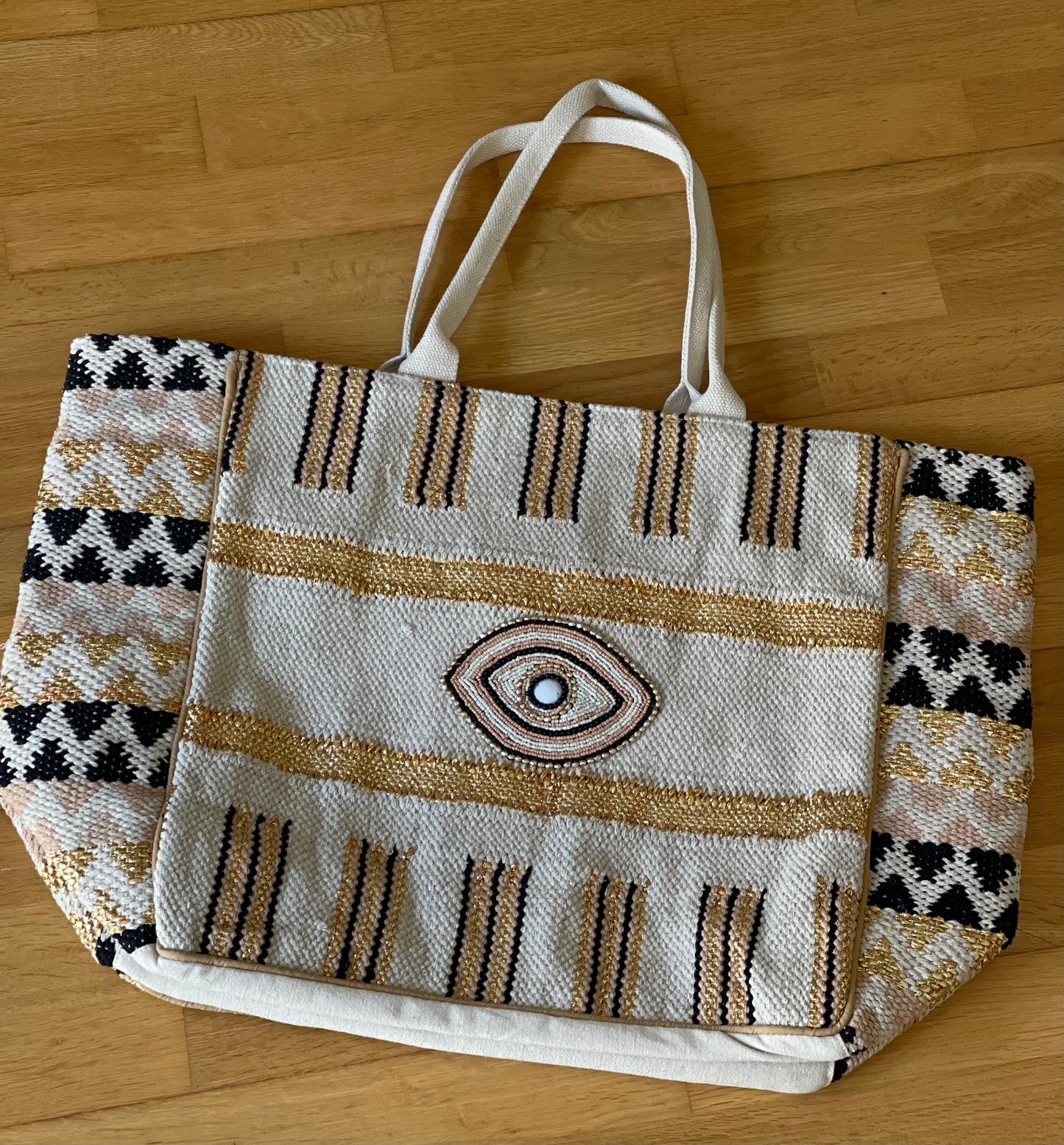 GOLDEN EYE | Cotton bag with beads